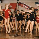 Children are practicing a choreographed routine for the celebration of Josip Broz Tito’s birthday.
