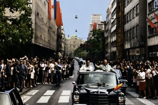 Tito and Jovanka greet citizens in one of their cars